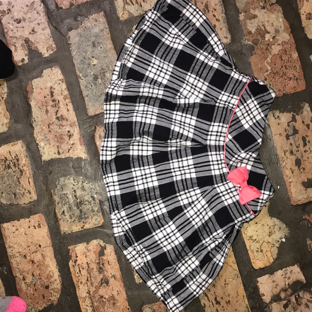 plaid skirt with pink bow